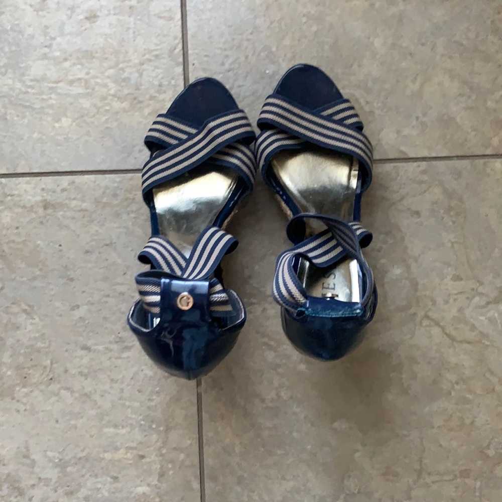 Guess high heeled platform pumps​